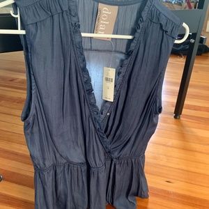 silky blue sleeveless wrap shirt with cinched wais